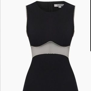 NWT Heiress Beverly Hills black mini w/rhinestones. Size large but fits a US 6.